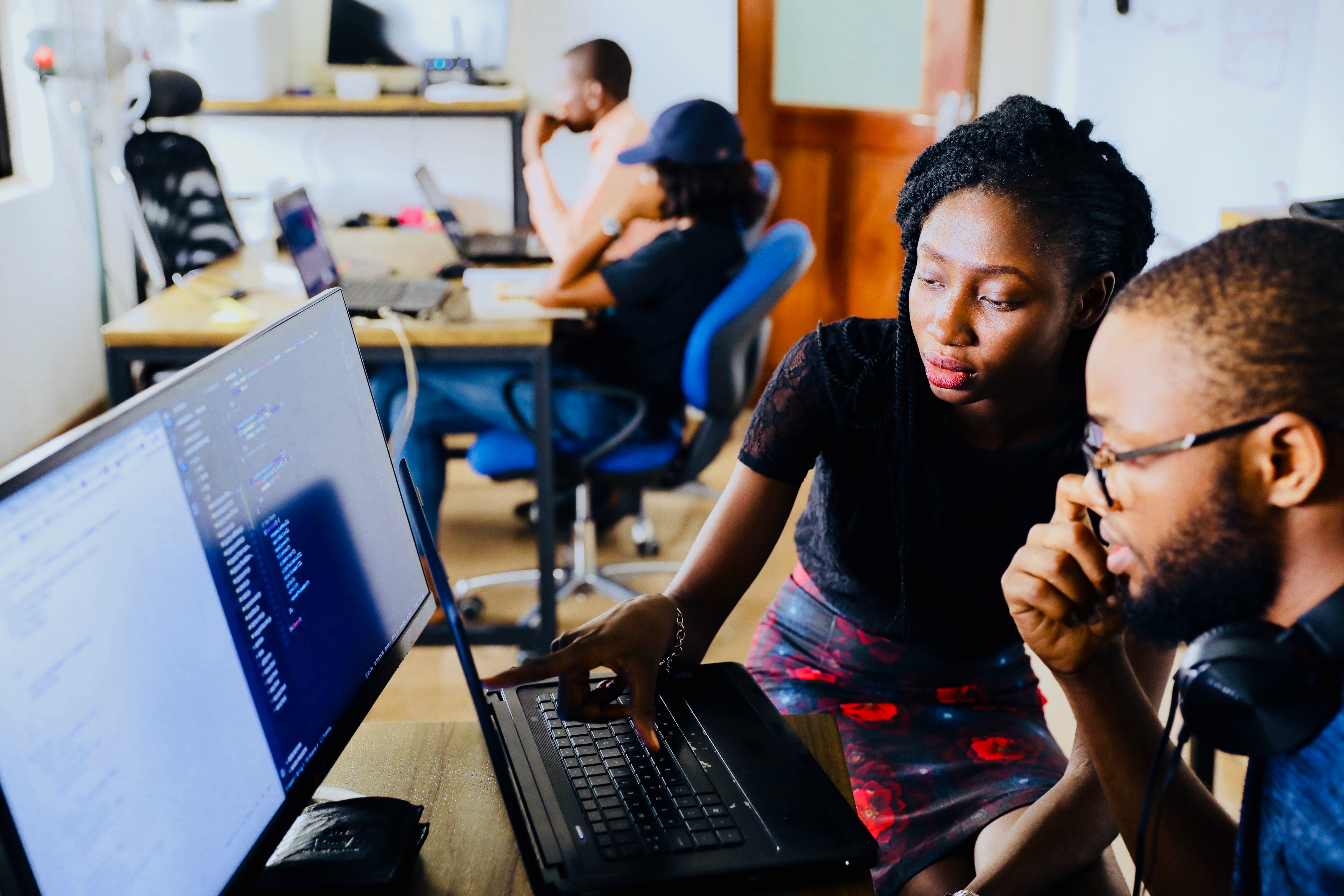 two people talking computer